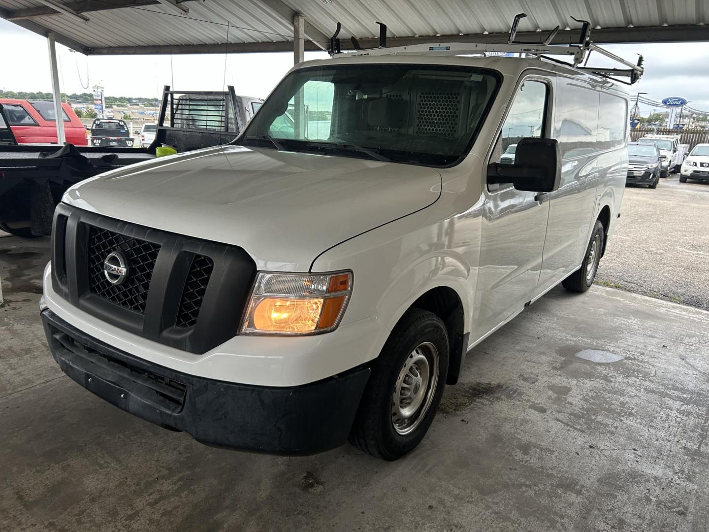2017 White Nissan NV Cargo (1N6BF0KM1HN) with an 4.0L V6 F DOHC 24V engine, AUTOMATIC transmission, located at 1687 Business 35 S, New Braunfels, TX, 78130, (830) 625-7159, 29.655487, -98.051491 - Photo#0