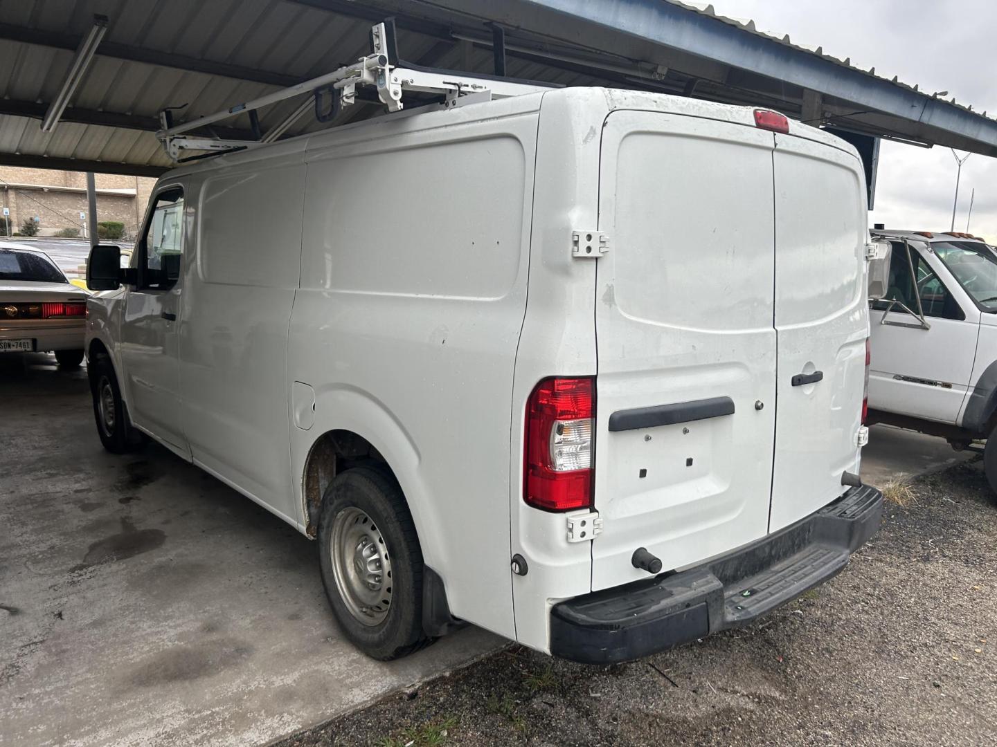 2017 White Nissan NV Cargo (1N6BF0KM1HN) with an 4.0L V6 F DOHC 24V engine, AUTOMATIC transmission, located at 1687 Business 35 S, New Braunfels, TX, 78130, (830) 625-7159, 29.655487, -98.051491 - Photo#1