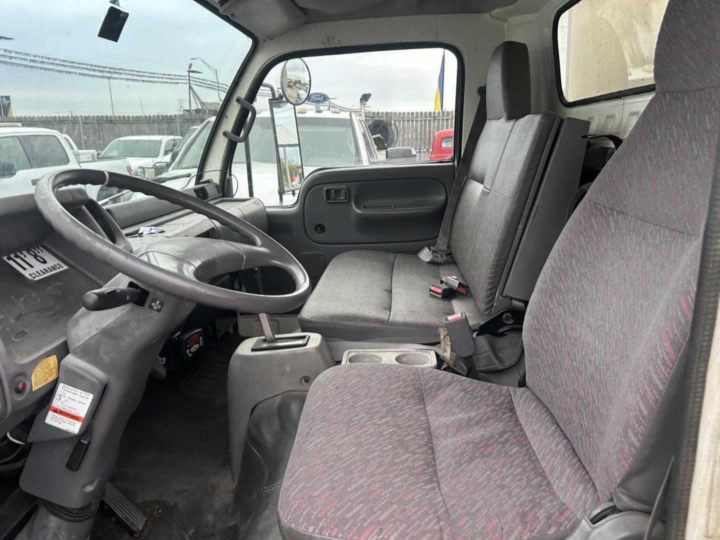 2000 Nissan UD1200 - (JNAUXV1J9YA) with an 4.6L L6 TURBO INTERCOOLER DIESEL engine, located at 1687 Business 35 S, New Braunfels, TX, 78130, (830) 625-7159, 29.655487, -98.051491 - Photo#3